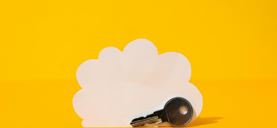 White paper cloud with key, cloud computing concept